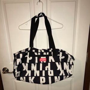 PINK white and black duffel bag